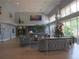 Comfortable lobby area featuring modern furniture, decorative plants, and serene atmosphere at 3918 Doune Way, Clermont, FL 34711
