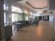 Inviting lobby with a variety of seating options, modern decor, and ample natural light at 3918 Doune Way, Clermont, FL 34711