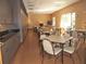 Bright meeting room with tables, chairs, and kitchenette for community events at 3918 Doune Way, Clermont, FL 34711