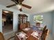 Charming dining room with a wooden table and hutch at 910 Lake Ave, Edgewater, FL 32132