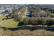 Aerial view of a long row of townhouses with surrounding neighborhood visible at 3204 Calabria Ave # 443, Davenport, FL 33897