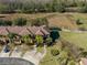 Aerial view of townhouses with spacious yards and lush landscaping at 3204 Calabria Ave # 443, Davenport, FL 33897