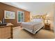 Guest bedroom with a full-size bed and ensuite bathroom at 3204 Calabria Ave # 443, Davenport, FL 33897