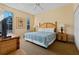 Spacious bedroom with king-size bed and patio access at 3204 Calabria Ave # 443, Davenport, FL 33897