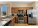 Updated kitchen, stainless steel appliances, granite countertops at 3204 Calabria Ave # 443, Davenport, FL 33897