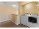 Upper-level laundry room with washer and dryer at 3204 Calabria Ave # 443, Davenport, FL 33897