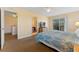 King-size bed, private bathroom access, and balcony access at 3204 Calabria Ave # 443, Davenport, FL 33897