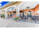 Outdoor patio seating with bar and multiple TVs at 3204 Calabria Ave # 443, Davenport, FL 33897