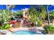 Resort-style waterpark featuring a waterslide and a large pool at 3204 Calabria Ave # 443, Davenport, FL 33897