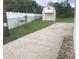 Large backyard with shed and concrete patio at 3115 Albert St, Orlando, FL 32806