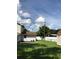 Large backyard with grassy area, shed, and patio at 3115 Albert St, Orlando, FL 32806