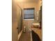 Clean bathroom with granite vanity and shower/tub combo at 3115 Albert St, Orlando, FL 32806