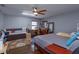 Spacious bedroom with ample natural light and wood flooring at 3115 Albert St, Orlando, FL 32806