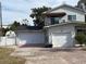 Two-story home with double garage and long driveway at 3115 Albert St, Orlando, FL 32806