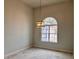 Dining room with chandelier and large window at 9507 Mid Summer Ln, Leesburg, FL 34788