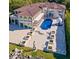 Aerial view of luxurious estate showcasing manicured grounds, long pool, and covered gazebo at 4852 S Peninsula Dr, Ponce Inlet, FL 32127