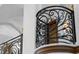 Close up of the intricate design of the wrought iron balcony railing at 4852 S Peninsula Dr, Ponce Inlet, FL 32127