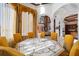 Bright dining room features a decorative table with seating and large window with custom valance at 4852 S Peninsula Dr, Ponce Inlet, FL 32127
