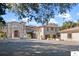 Expansive home featuring manicured lawn and a large fountain, creating a grand and luxurious curb appeal at 4852 S Peninsula Dr, Ponce Inlet, FL 32127