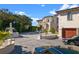 Expansive home exterior featuring manicured landscaping and an elegant fountain at 4852 S Peninsula Dr, Ponce Inlet, FL 32127