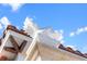 Elegant gargoyle adorning the roofline, adding a touch of architectural detail at 4852 S Peninsula Dr, Ponce Inlet, FL 32127