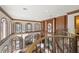 Spacious interior showcasing a second story view of the living room and windows at 4852 S Peninsula Dr, Ponce Inlet, FL 32127