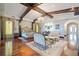 Primary bedroom with hardwood floors, sitting area, and decorative ceiling at 4852 S Peninsula Dr, Ponce Inlet, FL 32127