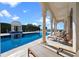 Stunning pool area with classical columns and gazebo at 4852 S Peninsula Dr, Ponce Inlet, FL 32127