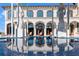 Reflecting water feature set against the backdrop of an impressive home at 4852 S Peninsula Dr, Ponce Inlet, FL 32127