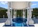Stunning water feature surrounded by elegant statues and lush greenery at 4852 S Peninsula Dr, Ponce Inlet, FL 32127