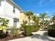 The homes feature patios with hot tubs, dining tables, and drought tolerant landscaping at 3001 Sea Plane Ln, Kissimmee, FL 34747
