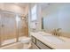 This bathroom has a glass shower, a toilet, and a vanity with a sink at 3001 Sea Plane Ln, Kissimmee, FL 34747