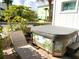 The home features a lounge chair and hot tub on the back patio at 3001 Sea Plane Ln, Kissimmee, FL 34747