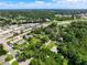 Aerial view showing neighborhood and a pond at 966 N Ronald Reagan Blvd, Longwood, FL 32750