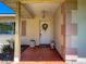 Inviting front entry with decorative accents and warm neutral tones at 966 N Ronald Reagan Blvd, Longwood, FL 32750