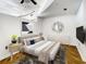 Comfortable bedroom featuring hardwood floors and modern decor at 155 S Court Ave # 2107, Orlando, FL 32801
