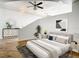 Bright bedroom with hardwood floors and neutral decor at 155 S Court Ave # 2107, Orlando, FL 32801