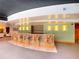 Community bar with seating and tile backsplash at 155 S Court Ave # 2107, Orlando, FL 32801
