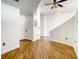 Clean hallway with hardwood floors and simple design at 155 S Court Ave # 2107, Orlando, FL 32801