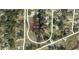 Residential lot available with surrounding houses visible at 14 Weston Rd, Leesburg, FL 34748