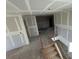 Unfinished staircase and hallway under construction at 14 Weston Rd, Leesburg, FL 34748