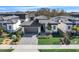 Modern home with gray roof and gray driveway at 3016 Kensington Ave, Davenport, FL 33837
