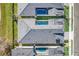 Two homes with private pools and gray roofs at 3016 Kensington Ave, Davenport, FL 33837