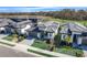 Luxury community featuring multiple homes with gray roofs at 3016 Kensington Ave, Davenport, FL 33837
