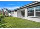 View of backyard, green space and homes at 3016 Kensington Ave, Davenport, FL 33837