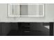 Bathroom with modern vanity and illuminated mirror at 3016 Kensington Ave, Davenport, FL 33837