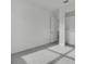 Bright bedroom with closet and access to another room at 3016 Kensington Ave, Davenport, FL 33837