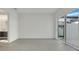 Bright bedroom with grey tile floor and sliding glass doors at 3016 Kensington Ave, Davenport, FL 33837