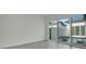 Bedroom with sliding glass doors opening to a private pool at 3016 Kensington Ave, Davenport, FL 33837