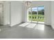 Bright breakfast room with tile floors and sliding glass doors at 3016 Kensington Ave, Davenport, FL 33837